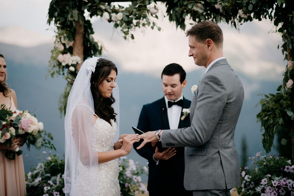Bride and Groom exchanging rings in Winter Park