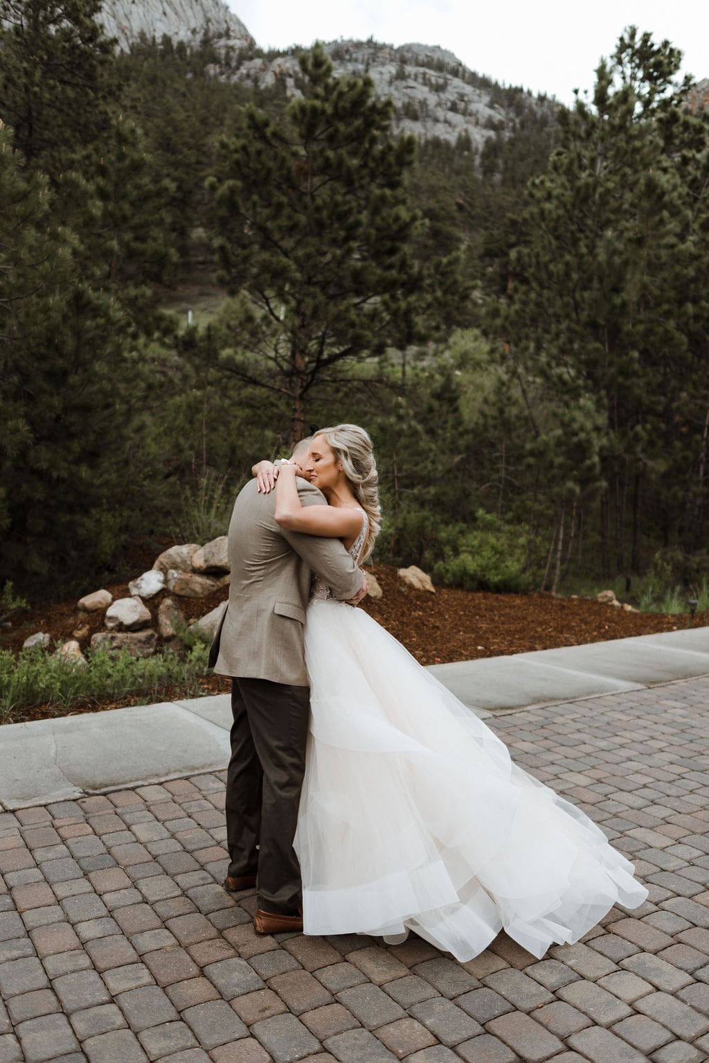 First look between bride and groom at Della Terra in Estes Park