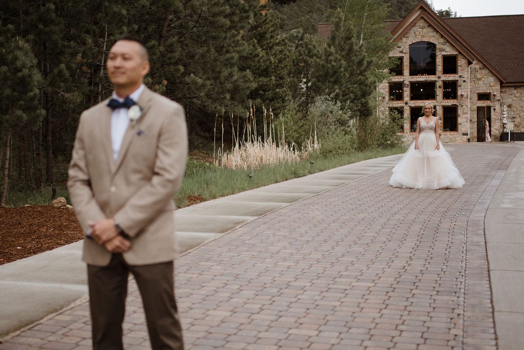 First look between bride and groom at Della Terra in Estes Park