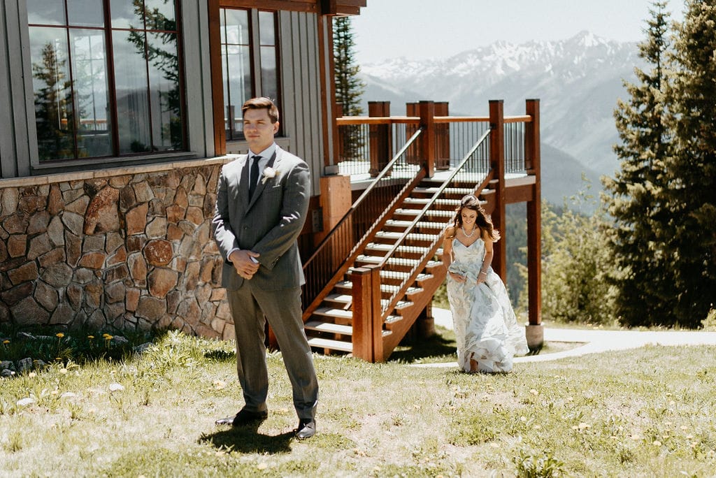 Bride and groom first look on Aspen Mountain at their wedding