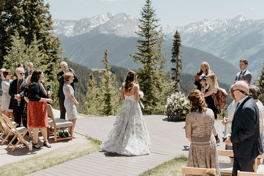 Bride walking down aisle at her Aspen Wedding at the Little Nell