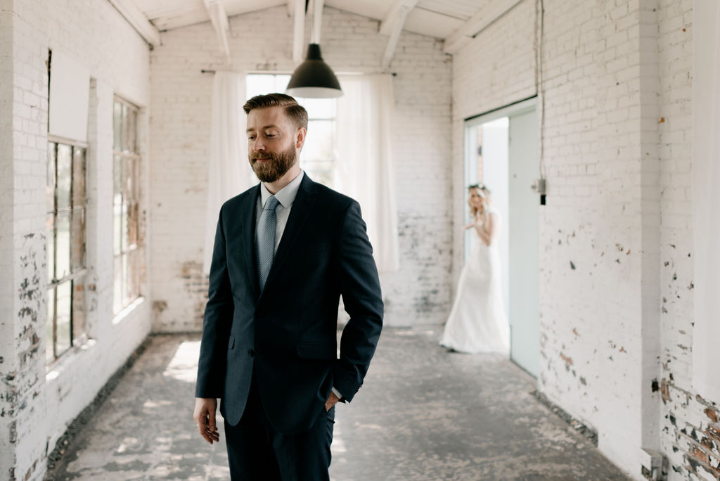Bride and Groom First Look at hickory street annex dallas wedding venue