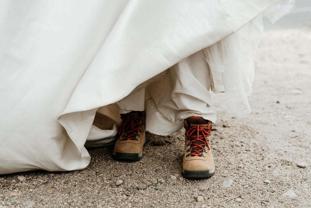 Bride in hiking boots in estes park