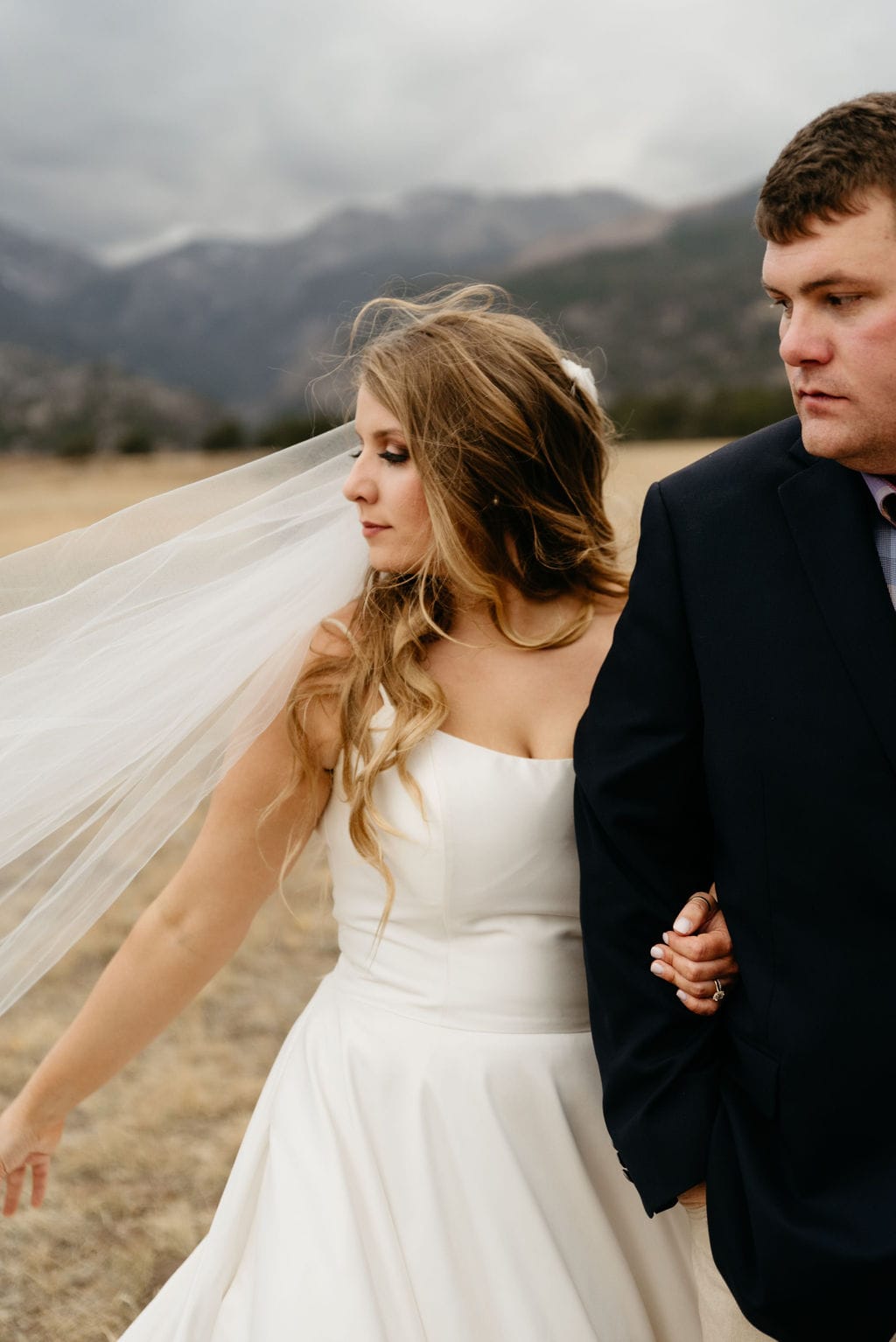 Romantic photo of bride and groom on their wedding day in estes park. Rocky Mountain National Park Elopement