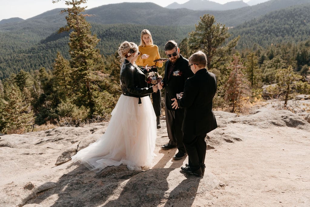 Son gives rings to mom and dad at their hermit park elopement