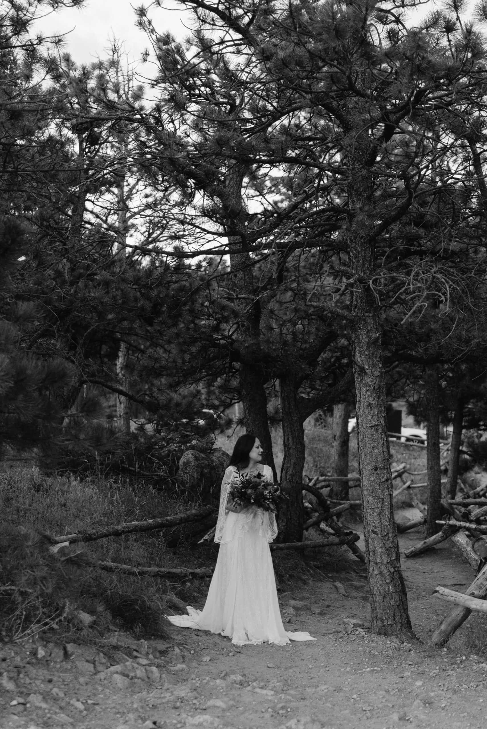 Bride in the forest before her first look