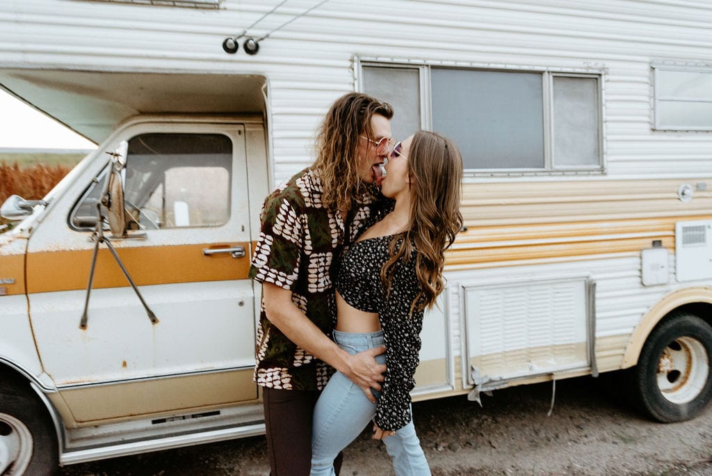 Dirty and grungy 70s inspired couples session with retro camper van 