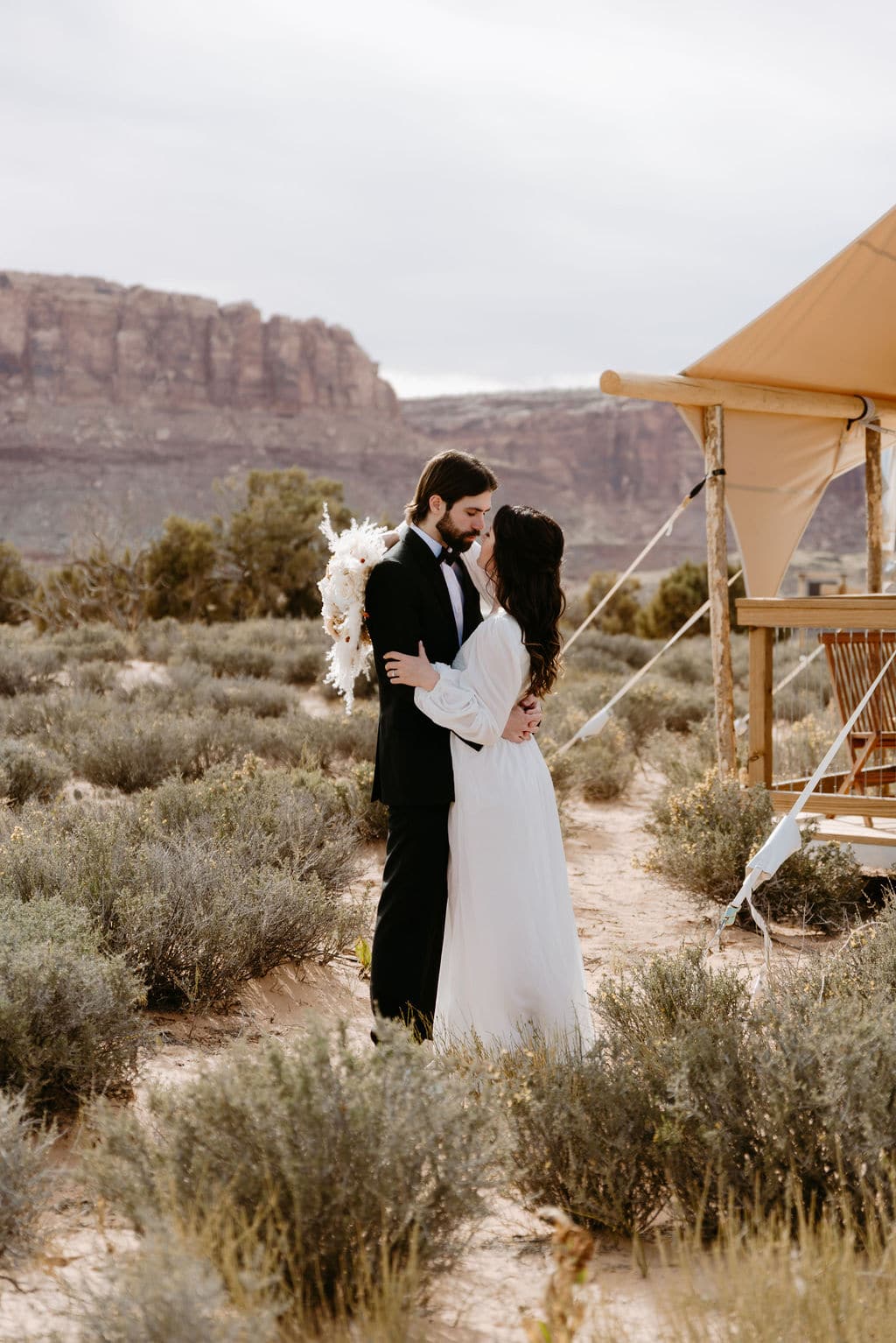 Bride and Groom Portrait at Glamping Tent in Moab Utah 