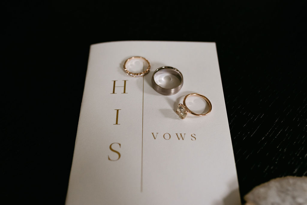 wedding rings on vow book