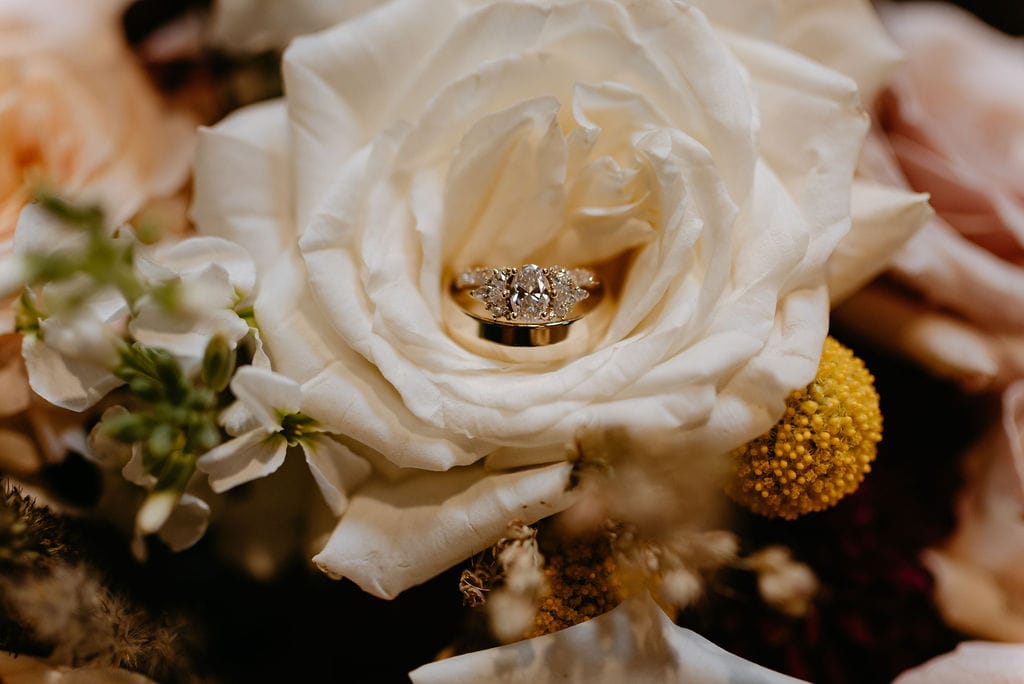 Vintage wedding ring and bridal bouquet