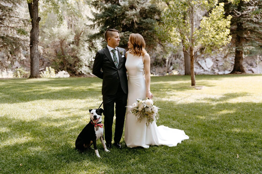 Wedding day portraits of couple with their dog