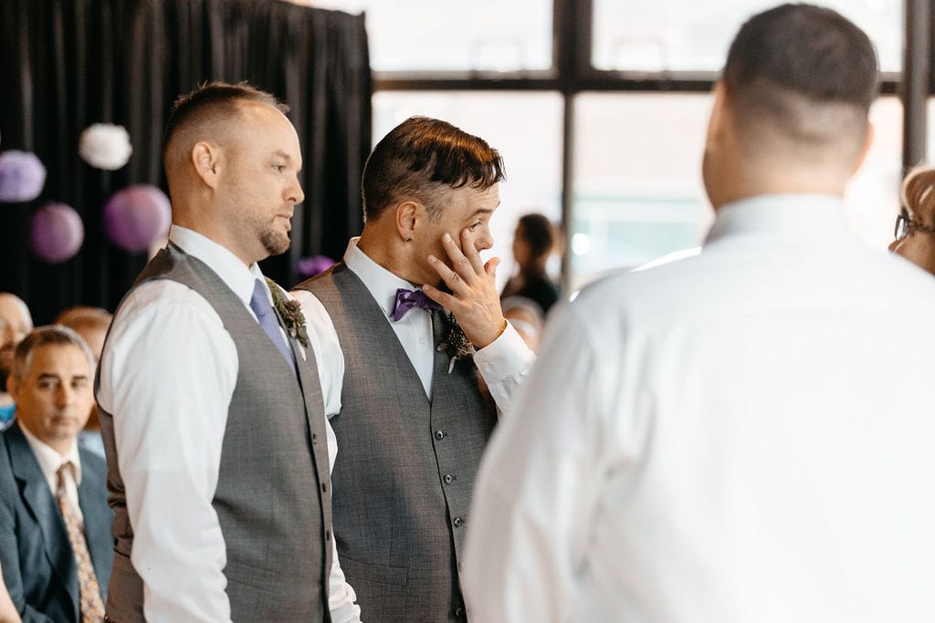 Groom cries during his Denver Colorado LGBTQ Wedding at Wash Park Studio