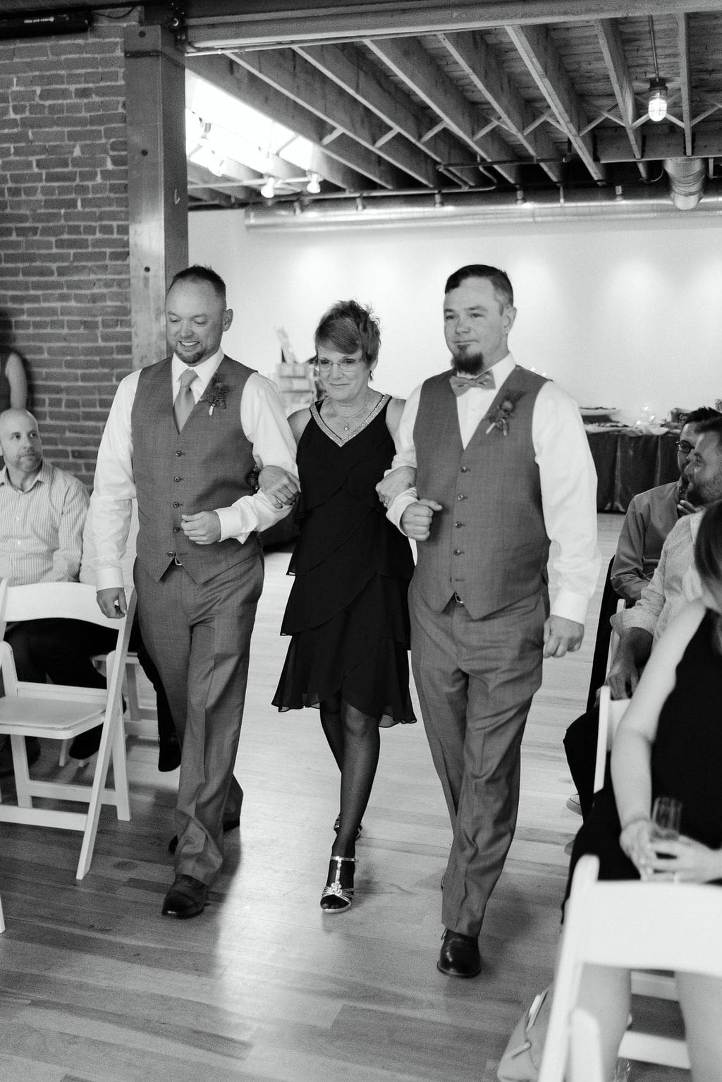 Mom walks son and son in law down the aisle at their Denver Colorado LGBTQ Wedding