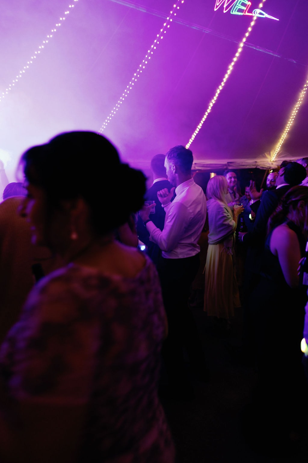 Epic dance floor photos at Blackstone Rivers Ranch wedding DJ'd by Ignight Entertainment with smoke and lazer show