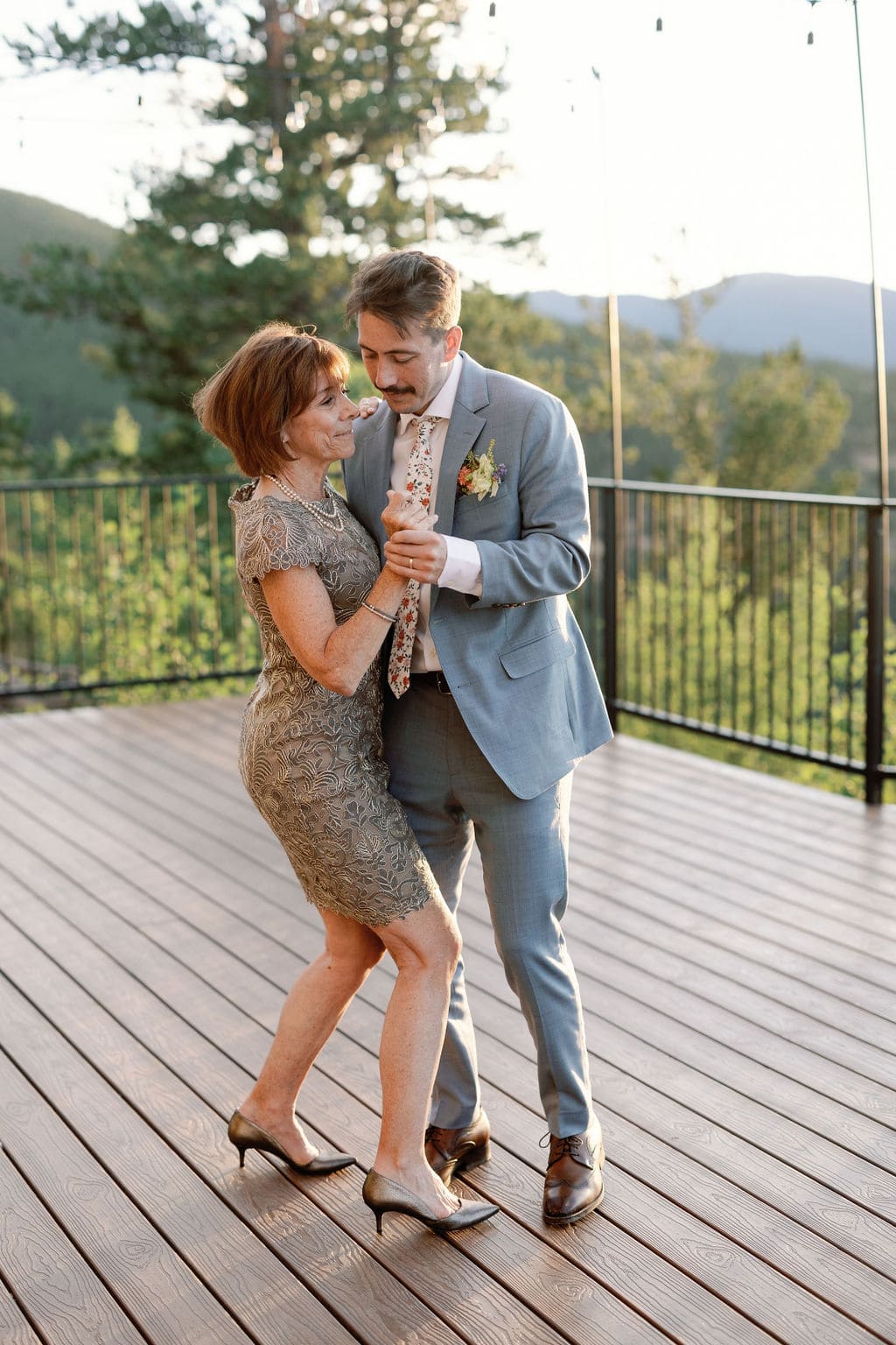 Groom dances with his mom on his wedding day at north star gatherings in Colorado 