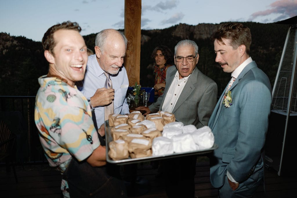 Epic wedding reception where Mountain Crust Catering serves ice cream sandwiches for desert at north star gatherings