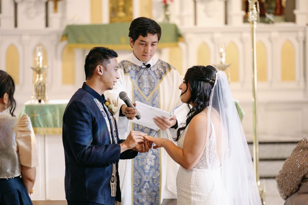 Couple's has their wedding ceremony at St Joseph Catholic Church Wedding in Denver