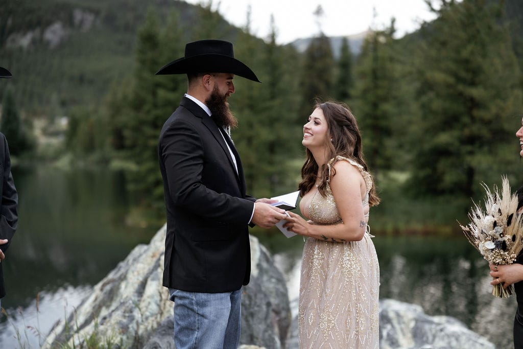 Couple gets married lakeside in the mountains of colorado at officers gulch.