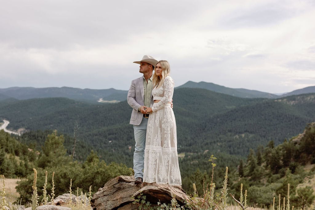 Gorgeous mount falcon couples portraits under stormy clouds overlooking the foothills