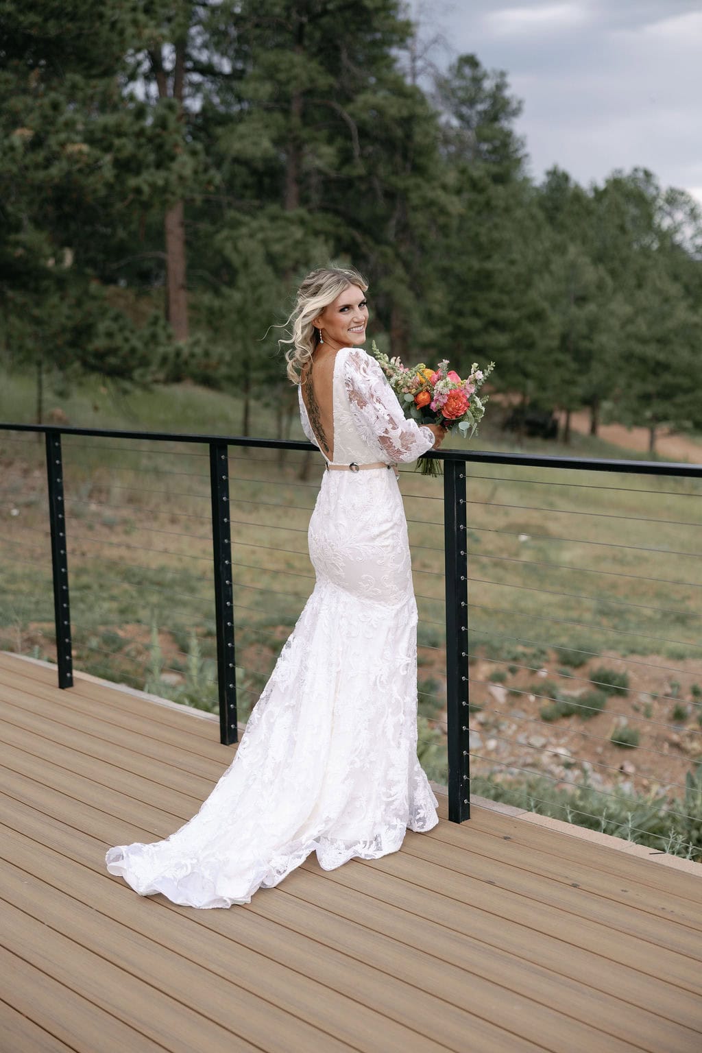 romantic bridal portraits on the deck at mountain view ranch lakeview
