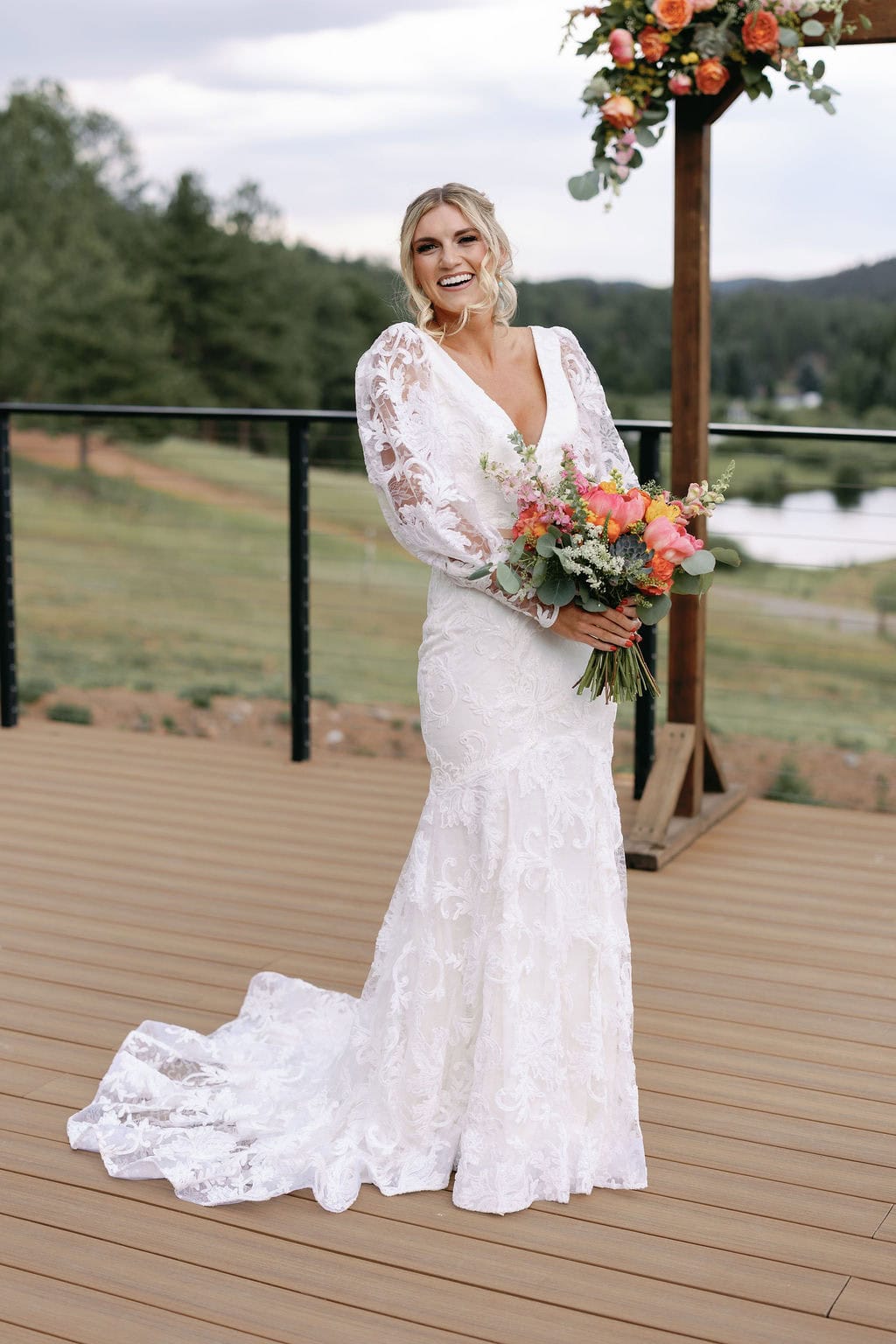romantic bridal portraits on the deck at mountain view ranch lakeview overlooking the lake