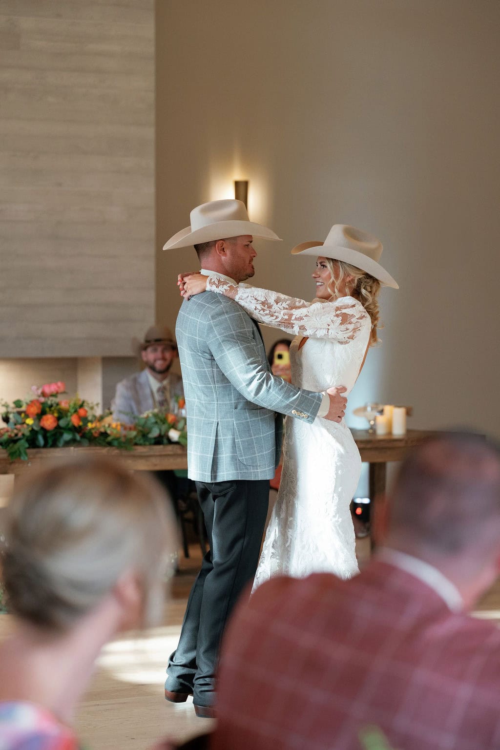 Couples first dance at their mountain view ranch lakeview wedding