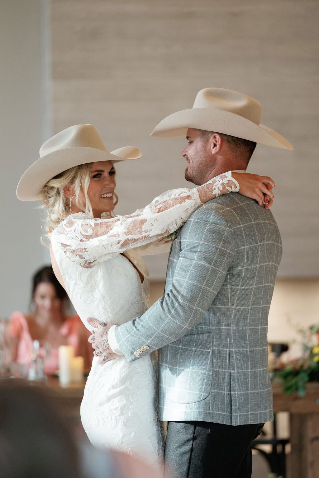 Couples first dance at their mountain view ranch lakeview wedding