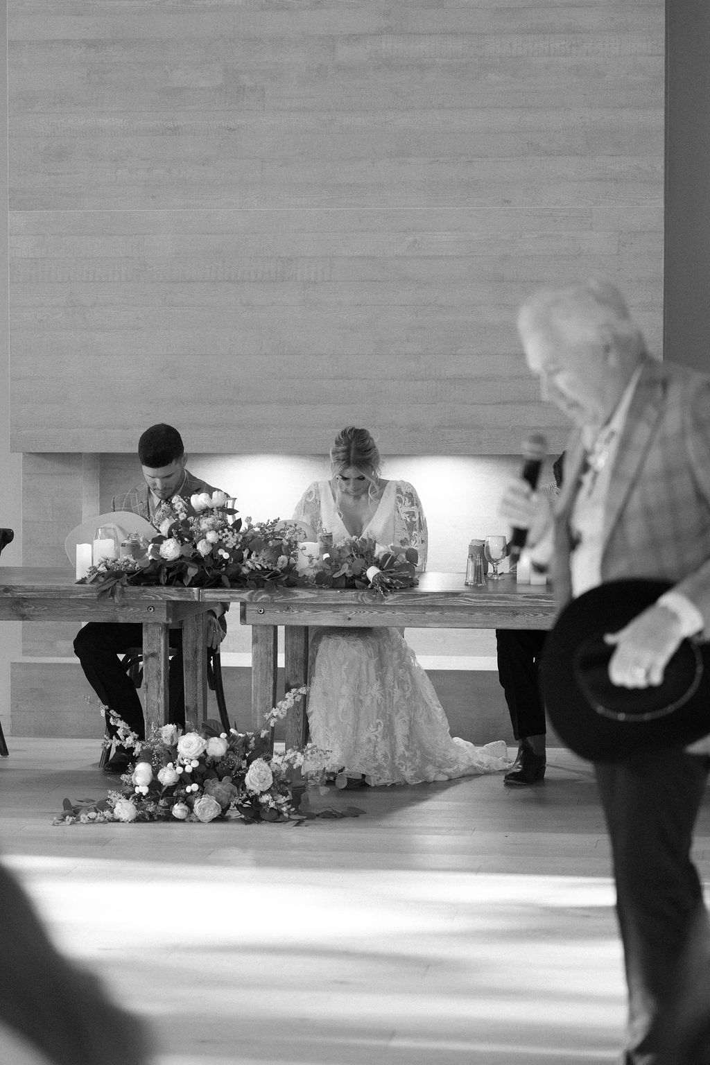 Couple prays just before they eat dinner at their Colorado wedding at mountain view ranch lakeview