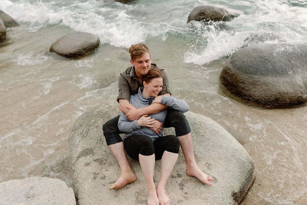 Playful engagement session at the beach in south lake tahoe