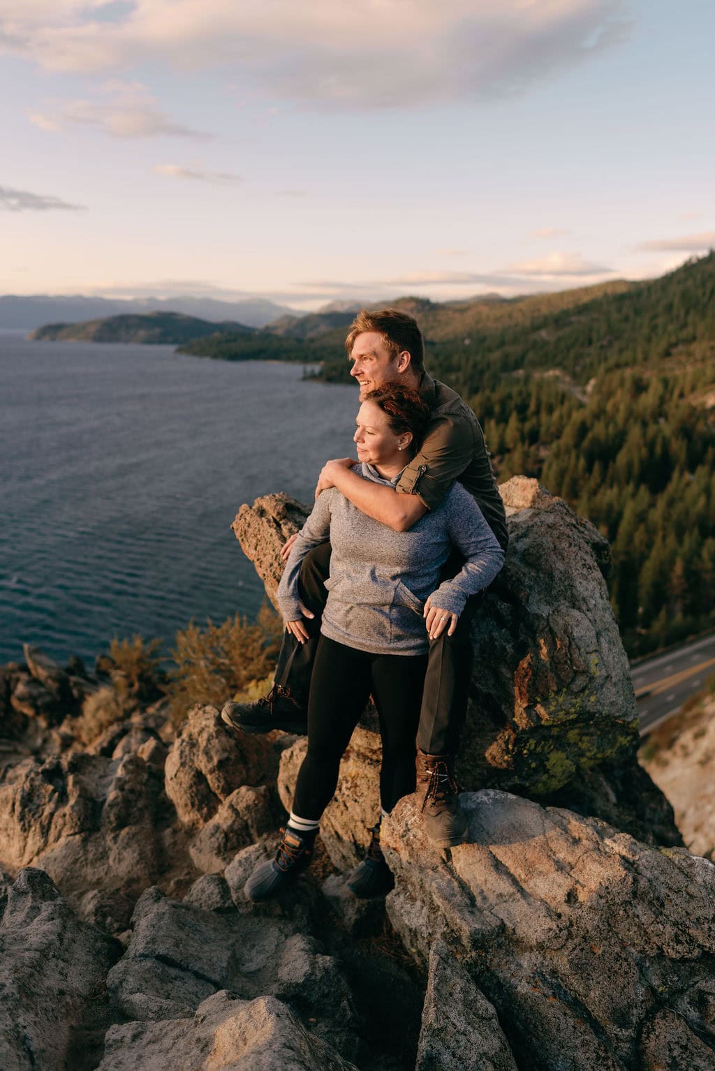 Sunset engagement session in south lake tahoe at Cave Rock