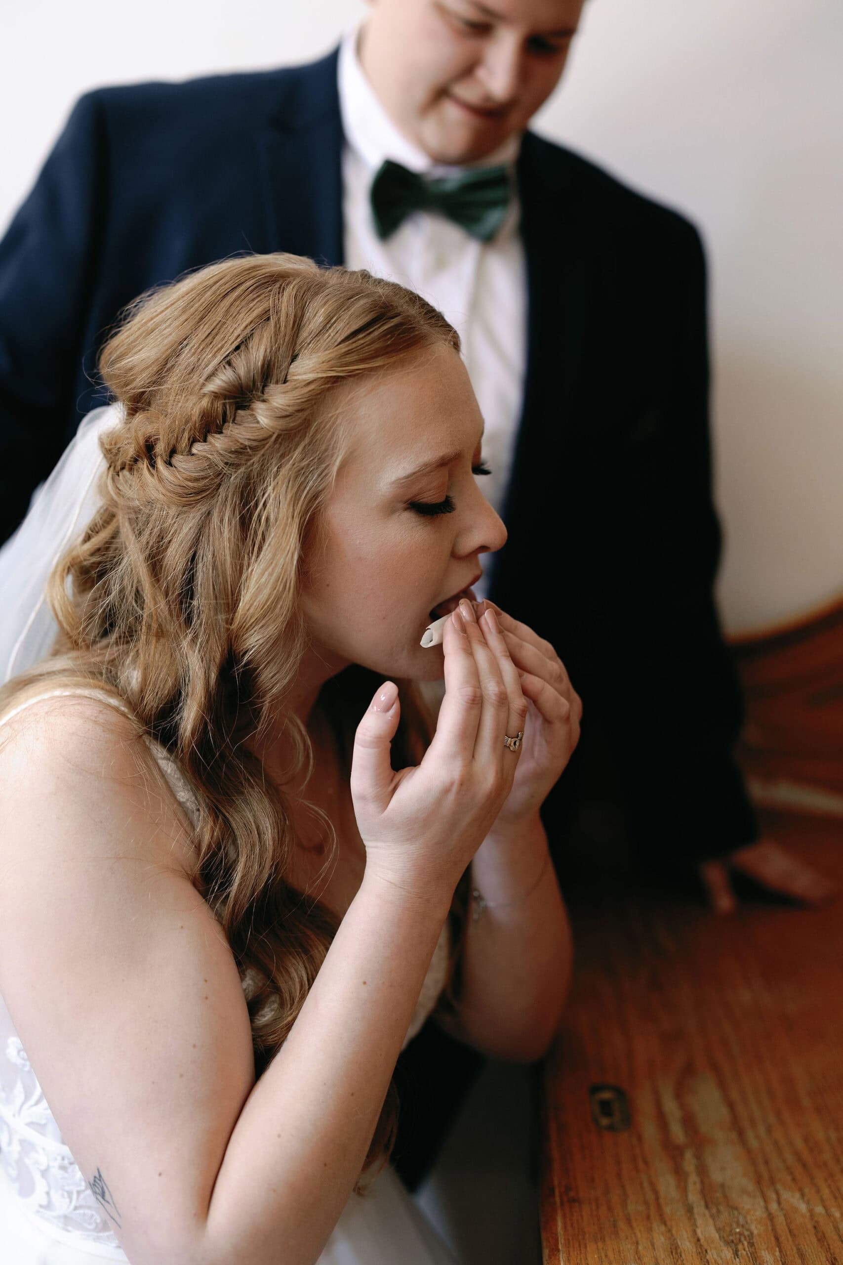 420 friendly wedding day in estes park colorado. LGBTQ couple rolls a joint to smoke before their wedding