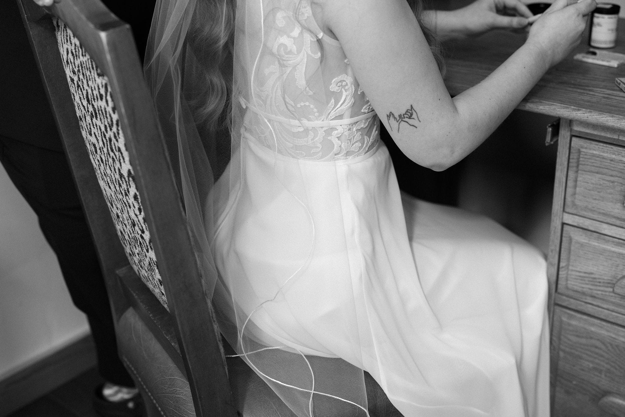 420 friendly wedding day in estes park colorado. LGBTQ couple rolls a joint to smoke before their wedding