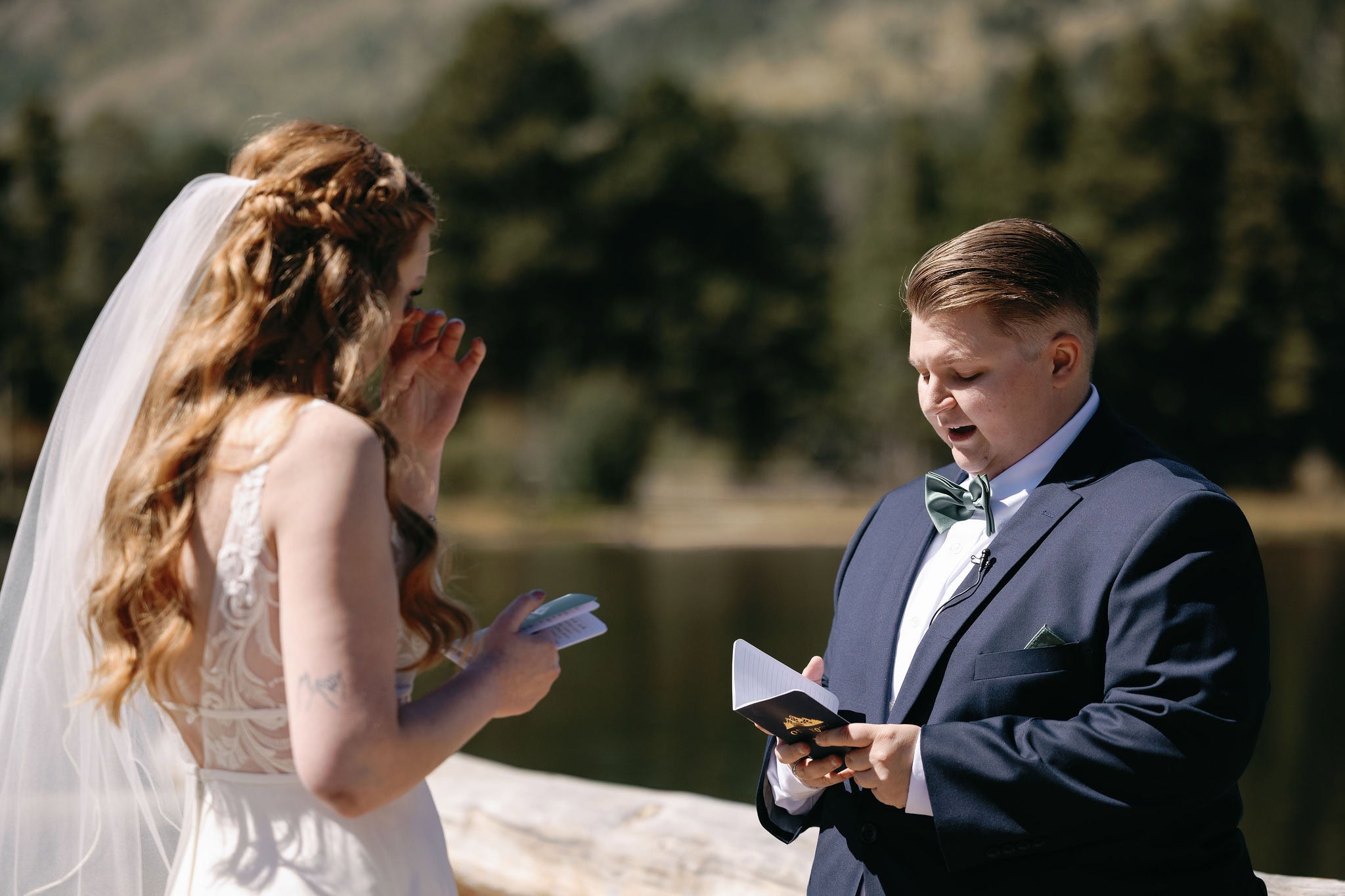 LGBTQ+ Wedding at Sprague Lake in Rocky Mountain National Park Colorado. Two Brides having a romantic lakeside Colorado wedding