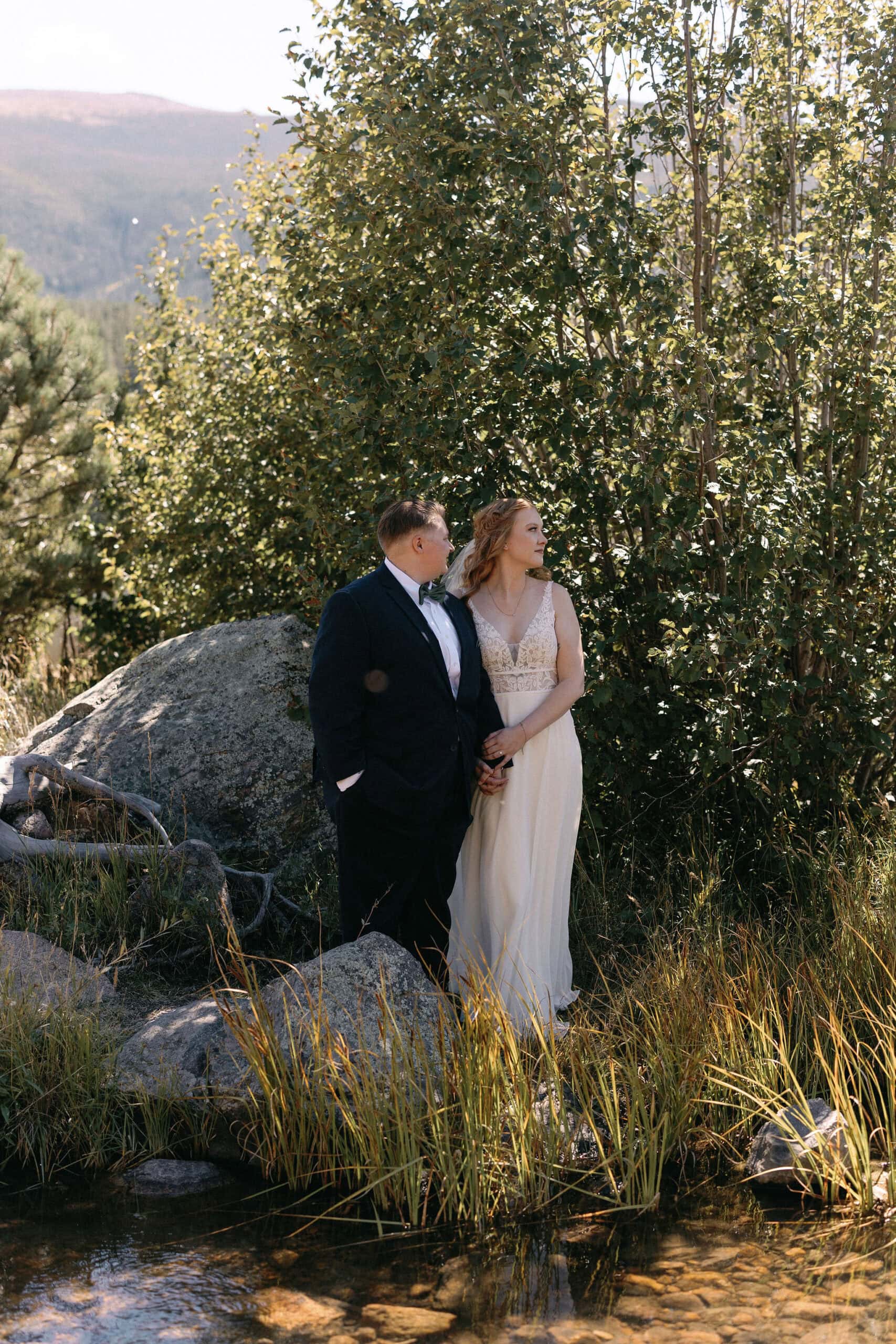 Bride and Bride portraits at Sprague Lake during a RMNP LGBTQ wedding in Estes Park on a gorgeous fall afternoon.