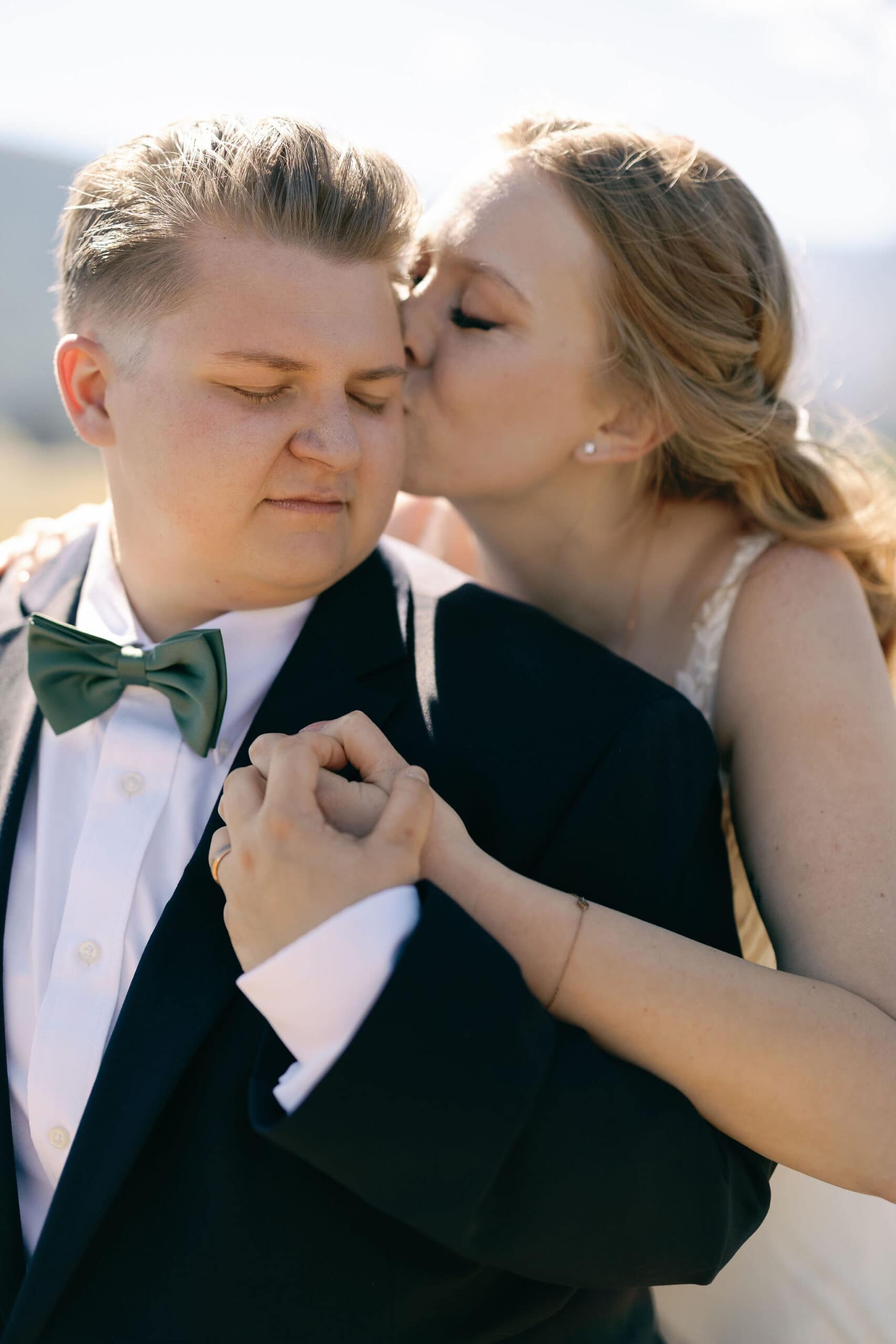 romantic Bride and Bride portraits at moraine park during a rocky mountain national park wedding