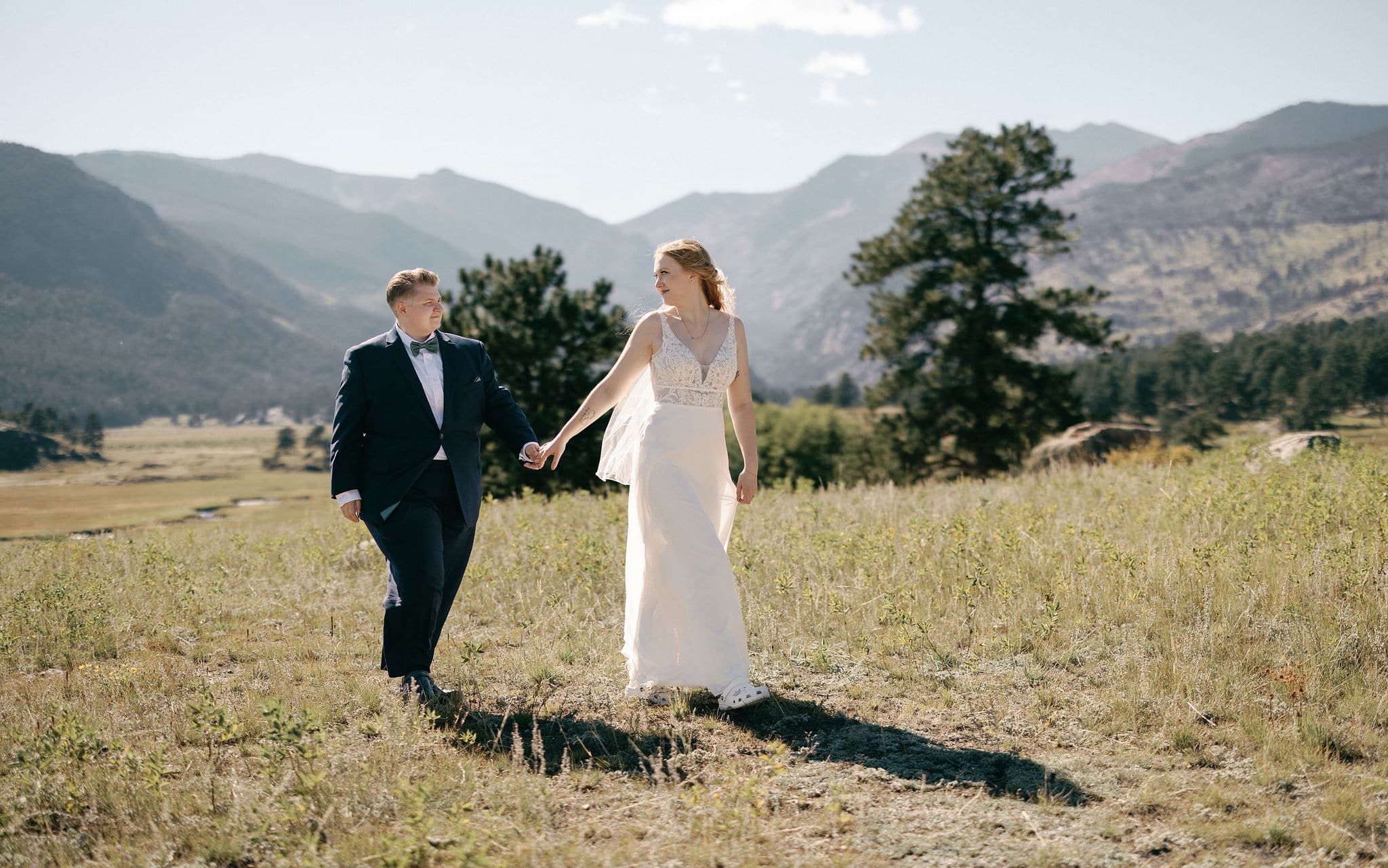 Romantic Bride and Bride portraits at moraine park in rocky mountain national park.