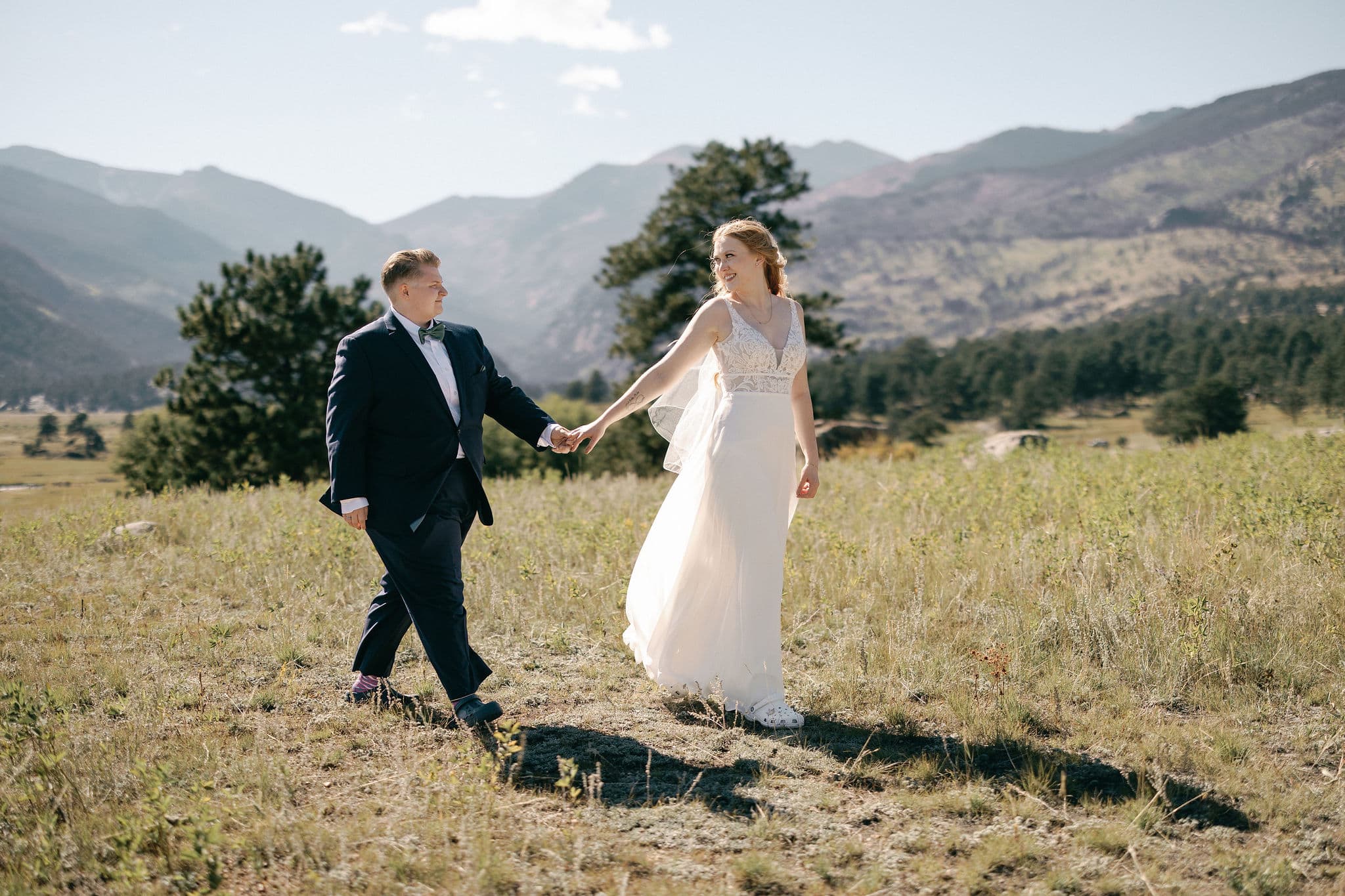 Romantic Bride and Bride portraits at moraine park in rocky mountain national park.