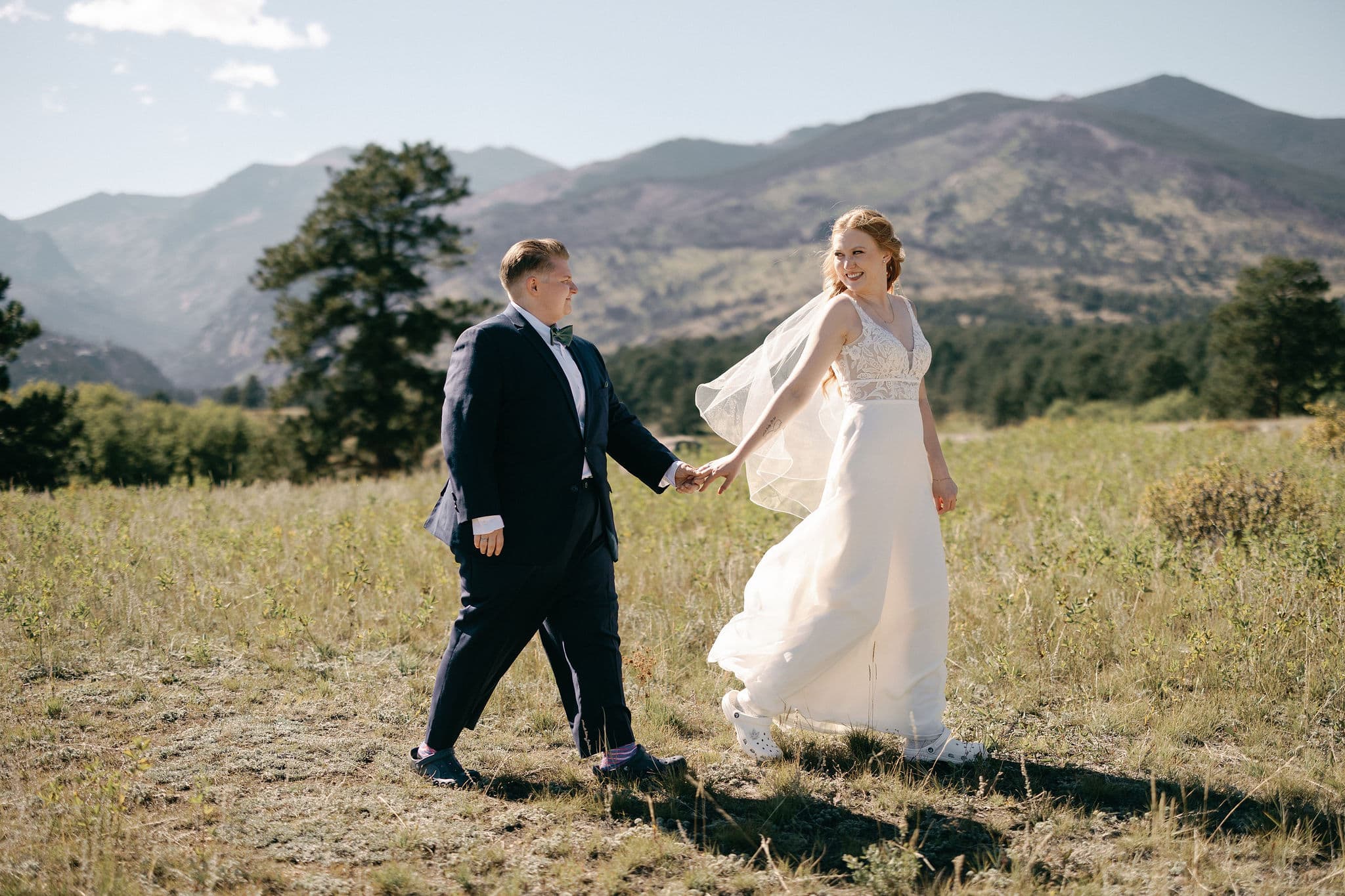 Romantic Bride and Bride portraits at moraine park in rocky mountain national park.