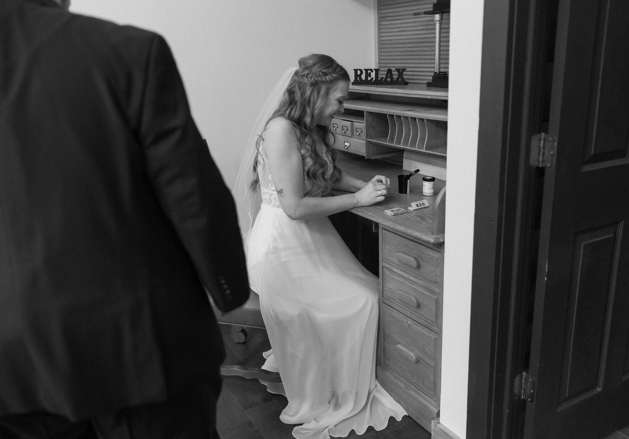 420 friendly wedding day in estes park colorado. LGBTQ couple rolls a joint to smoke before their wedding