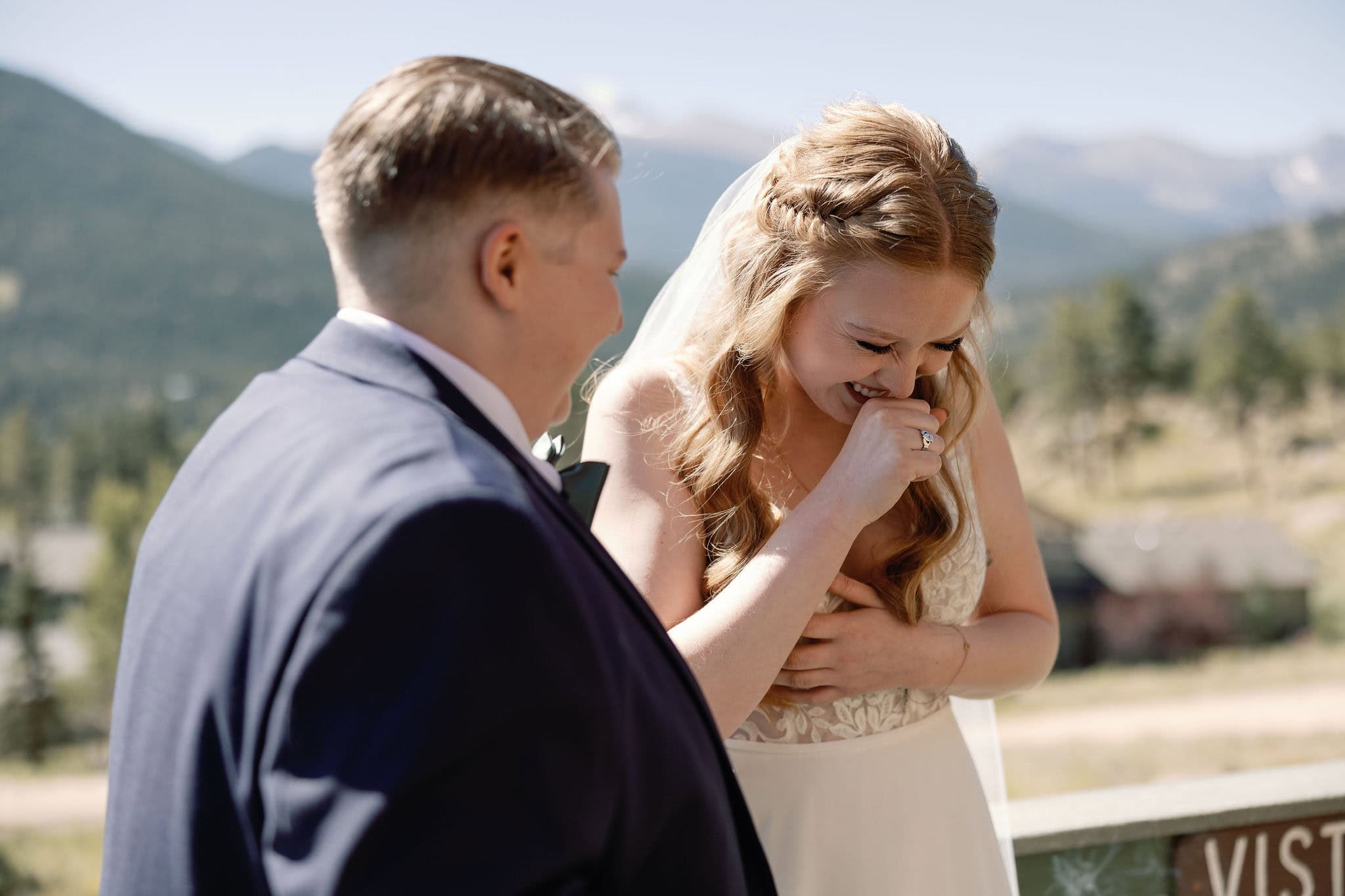 lgbtq couple shares a joint before they get married in estes park colorado during their cannabis friendly colorado wedding