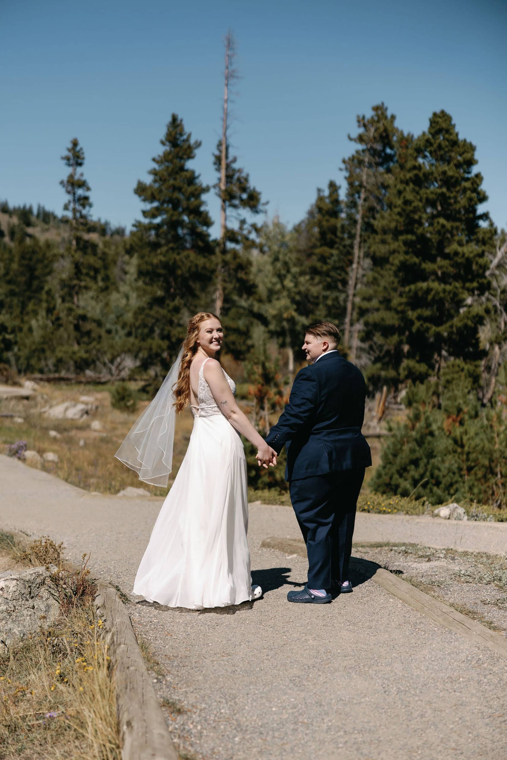 Bride and Bride portraits at Sprague Lake during a RMNP LGBTQ wedding in Estes Park on a gorgeous fall afternoon.