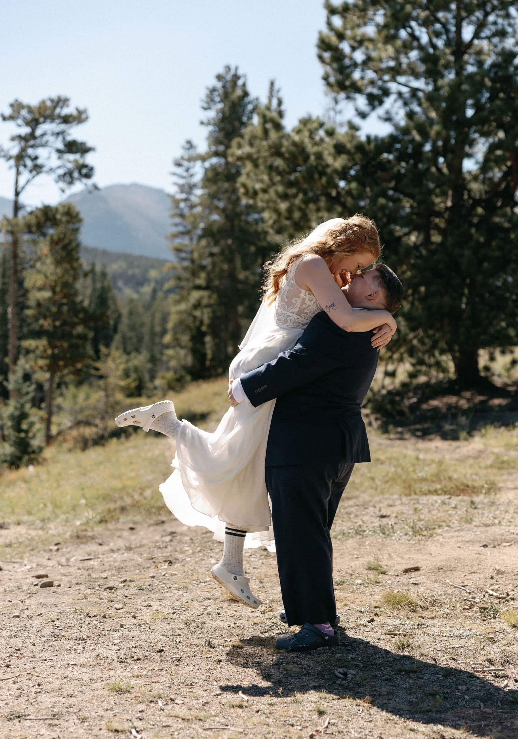 Bride and Bride portraits at Sprague Lake during a RMNP LGBTQ wedding in Estes Park on a gorgeous fall afternoon.