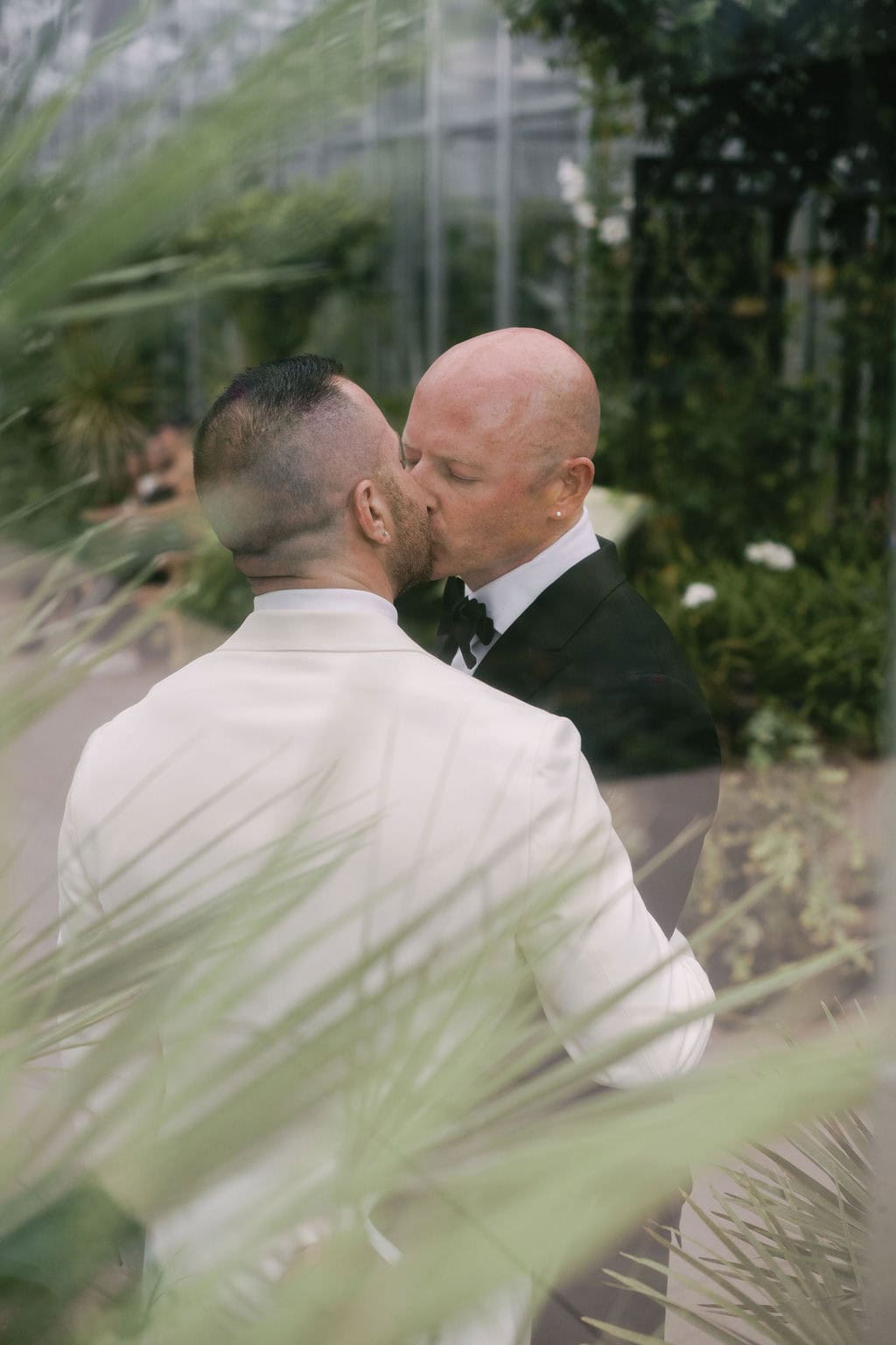 Groom Portraits at Denver Botanic Gardens Orangery on a Rainy Summer Day