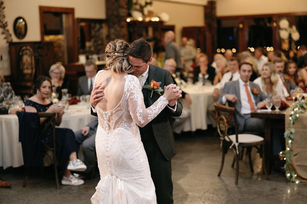 Romantic and emotional first dance between bride and groom at their boulder colorado wedding at Shupe Homestead Wedding Venue