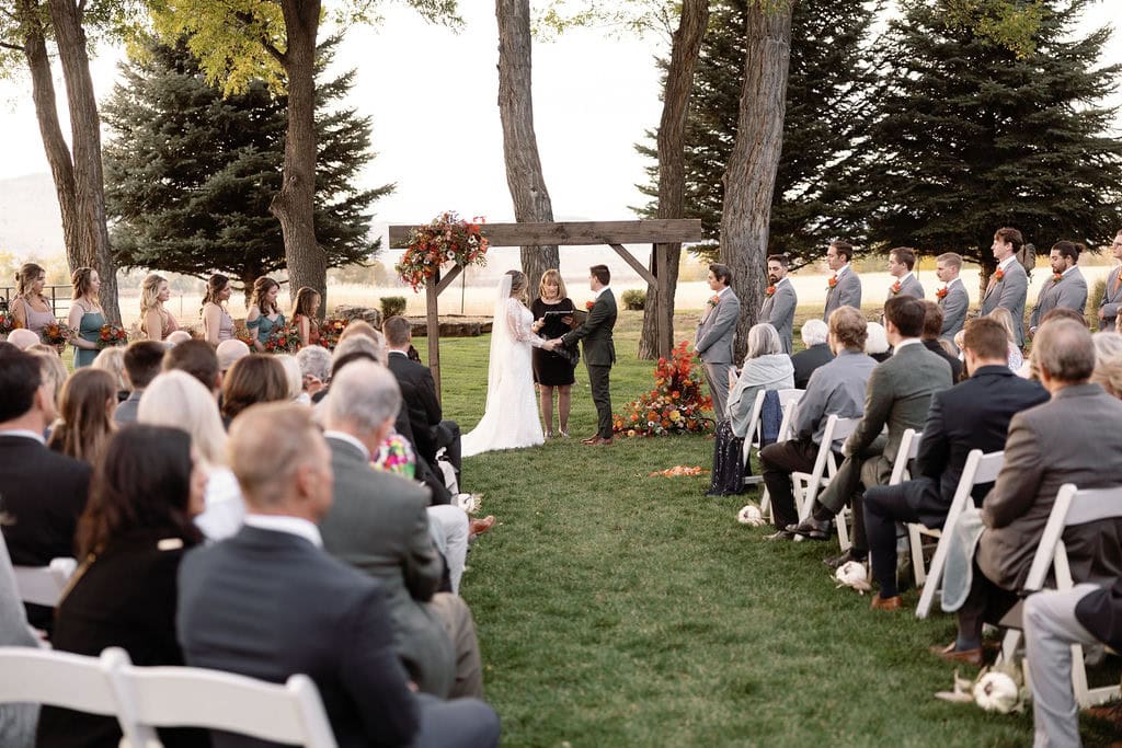 Beautiful fall wedding ceremony at shupe homestead boulder wedding venue