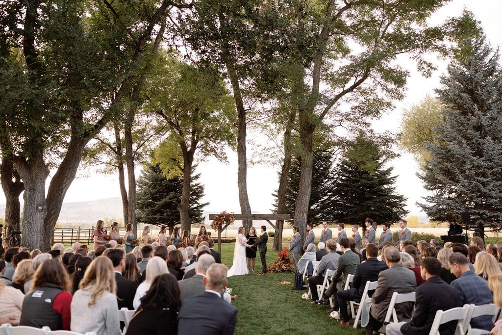 Beautiful fall wedding ceremony at shupe homestead boulder wedding venue