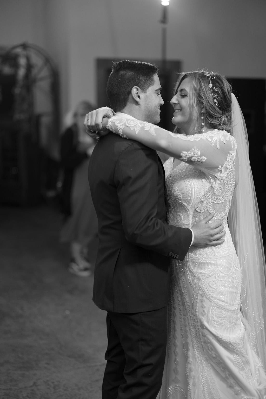 Romantic and emotional first dance between bride and groom at their boulder colorado wedding at Shupe Homestead Wedding Venue