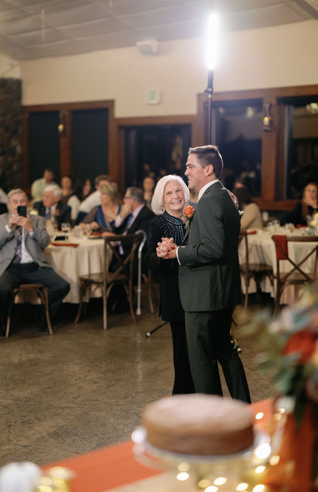 Groom dances with his grandmother at his wedding at shupe homestead near boulder colorado
