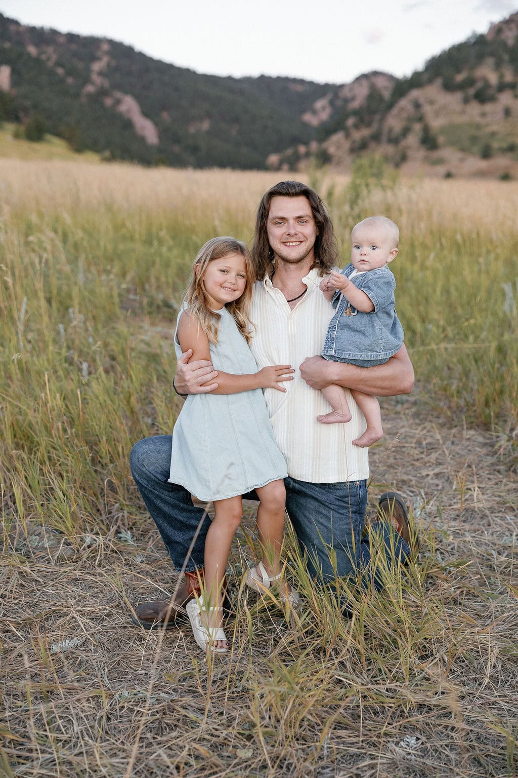 Dad with his kiddos at his Family photo session at chautauqua park in boulder 