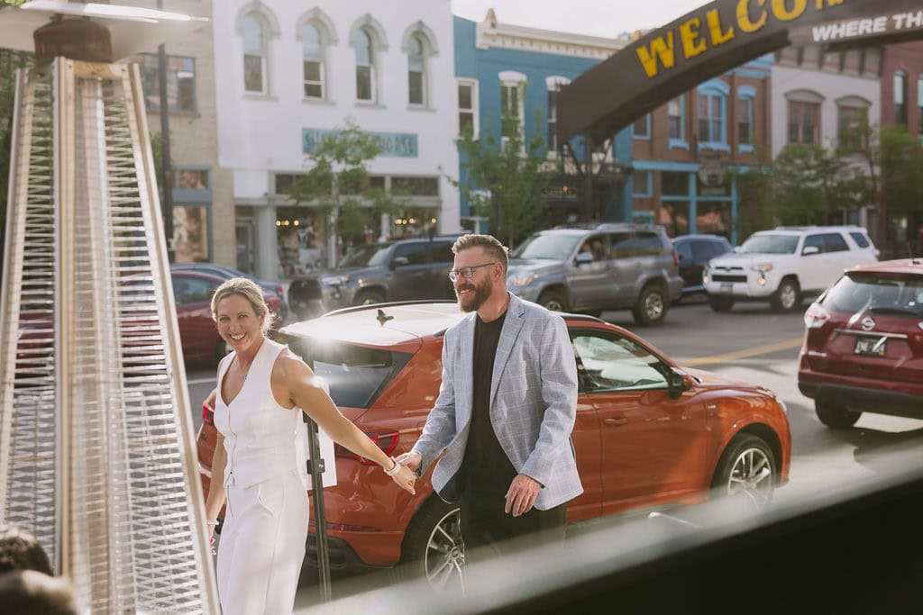 Natural and candid wedding welcome party portraits in downtown Golden, Colorado